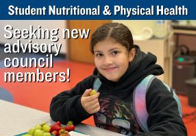  image of student at lunch with seeking advisory council members